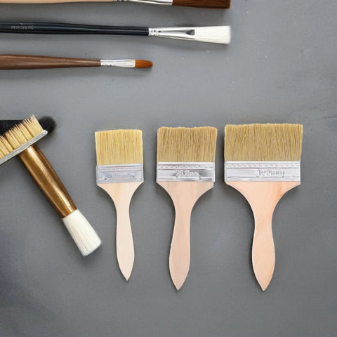 Three Piece Paint Brush Set For Deck, Fence, Wall Stain, Durable Wood Handle Workhorse Brushes on gray surface