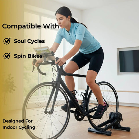 Woman cycling indoors wearing Women's Indoor Spin Shoes With Preinstalled SPD Cleats Ready To Ride Grippy Sole Compatible With Most Spin Classes and Indoor Bikes, Pink Size US 7.5 and EU 38 Includes Cleats Comfortable All Day Fit, focus on the cycling shoes.