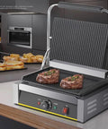 Heavy Duty 2200W Commercial Sandwich Maker And Electric Grilled Toaster grilling two steaks on a non-stick press with adjustable thermostat.