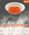 Orange 24 Piece Elastic Smoke Detector Covers For Cooking Or Baking Thickened Plastic Fire Alarm Shield in use, with smoke effects