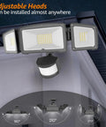 Motion Sensor Outdoor Flood Light With Three Adjustable Heads, IP65 Waterproof LED Security Floodlight, installed on house exterior