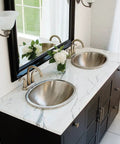 Edison Dual Mount Oval Bathroom Sink in Hammered Nickel Finish on modern double vanity with mirror and marble countertop
