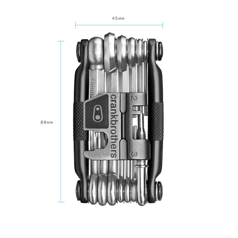 All-In-One Bike Multitool M19 Matte Black with hex wrenches, torx, chain tool, ergonomic side grips, dimensions labeled.