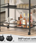 Sleek Black Three Tier Bar Cart With Smooth Rolling Lockable Wheels And Top Shelf Storage featuring 360° swivel casters, glassware and bottles.