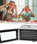 Six Tray Electric Food Dehydrator Machine With Dead Simple Operation Adjustable Temperature And Timer Slick Stainless Steel Build, clear window showing drying racks.