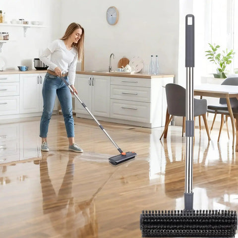 Woman using 64 Inch Floor Scrub Brush With 360 Degree Swivel Head And Detachable Long Handle For Heavy Duty Cleaning in kitchen