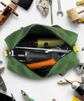 Canvas Tool Bag For Handyman Pros 12 Inch Small Tote with tools inside. Zipper open showing wrenches and screwdrivers on canvas surface.