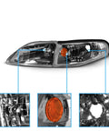 AmeriLite gun-metal replacement headlight set for 1994–1998 Ford Mustang passenger and driver sides, front view