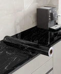 Self Adhesive Marble Countertop Wallpaper Peel And Stick Black Marble Design With Grid Back For Easy Cutting 18 Inch By 394 Inch Roll on kitchen counter