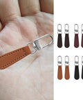 Dope 8 Piece Leather Zipper Pull Replacement Kit With Detachable Handles, Decorative Charms in hand and color selection.