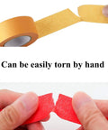 Person tearing red tape by hand, demonstrating Ten Pack Colorful Masking Tape Set Easy Tear, 1 Inch Wide By 13 Yards Each, 390 Feet Total.