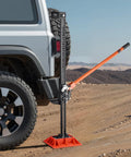 VEVOR 48-inch farm jack with base installed beside rear tire, orange handle, 3.18-ton capacity