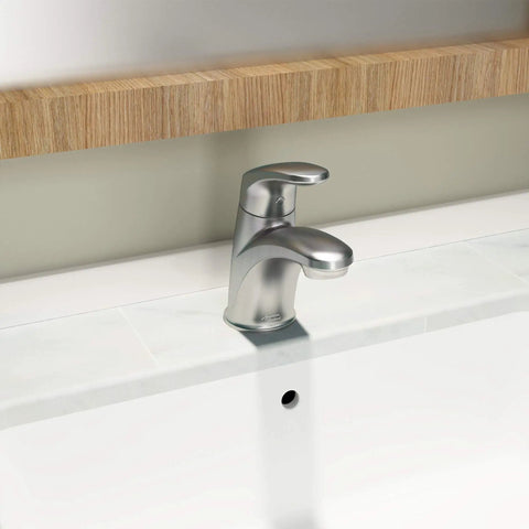Colony Pro Single Handle Bathroom Faucet With Metal Pop Up Drain 1.2 GPM Brushed Nickel installed on white countertop