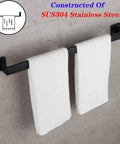 24 Inch Contemporary Stainless Steel Towel Bar Wall Mount With Slick Matte Black Finish holding white towels