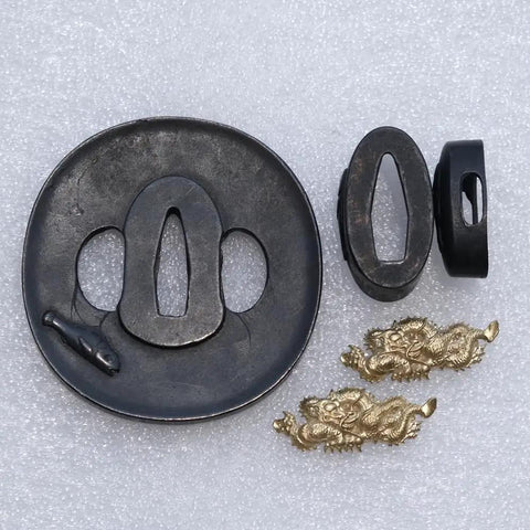 Samurai Sword Koshirae Set With Tsuba Fuchi Kashira And Menuki In Black Stainless Steel Tsuba And Copper Accents 8 To 9 Cm Tsuba