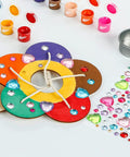Close-up of Two Pack Diy Wooden Bird Feeder Craft Kits For Kids Outdoor Fun, with paints and rhinestones for decoration.