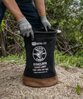 Person using Beefy Heavy Duty Canvas Tool Bucket With Zip Top Flame Resistant Closure For Overhead Lifts outdoors