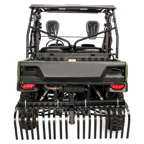 Back view of Heavy Duty ATV UTV Landscape Rake For Rock Debris Removal, attached to ATV with visible tines.
