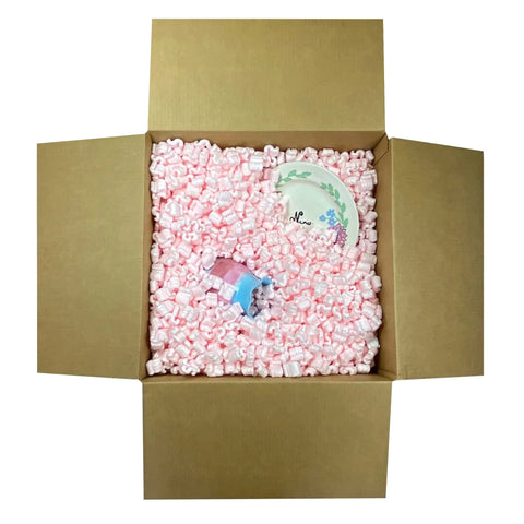Solid Antistatic Packing Peanuts In Bulk Six Cubic Feet Of Super Snug White Cushioning in a cardboard box with fragile items.