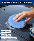 Hand using Six Pack 5 Inch Car Wax Applicator Pads, Round Foam And Microfiber Buffing Pads For Detailing on car hood