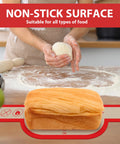 Person kneading dough with Nonstick Silicone Bread Sling Set Oval And Round Easy Grab Handles on floured counter