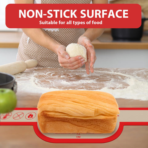 Person kneading dough with Nonstick Silicone Bread Sling Set Oval And Round Easy Grab Handles on floured counter