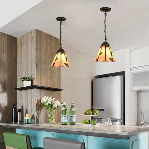 Six Inch Tiffany Style Pendant Ceiling Light With Pastoral Stained Glass For Restaurant Hallways Kitchens And Bars Hanging Fixture 110 240V E27 Base 40W Lamp illuminating a modern kitchen.