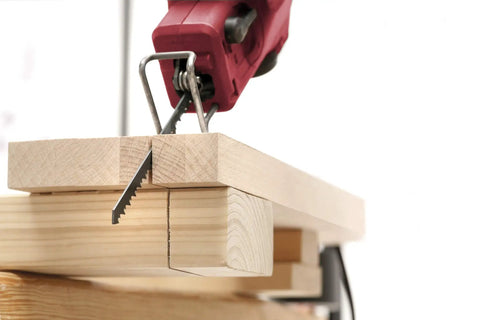 Ultra Tough Extra Long Single Lug Jigsaw Blades Designed For No Sweat Cutting Through Wood Hardwood Chipboard And Soft Plastics Pro Level Precision Results Pack Of Twenty Fits Einhell Bosch Jigsaws cutting through wooden boards.