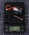 Full Metal 2 Speed Transmission Gearbox With Base For 1 To 18 FMS Crawler Parts Black on digital scale showing 111.3g