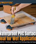 Arachni-Flex 24 By 48 Inch Waterproof PVC Foldable Workbench Tabletop in use, pre-drilled dog holes and quick-insert locks visible