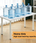 Beefy Adjustable Metal Desk Legs For DIY Office Desks Workbenches And Dining Tables With 1 Inch Leveling Feet 27.5 Inch High Set Of 4 White Finish For A Solid Wobble Free Workspace supporting water jugs