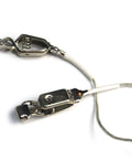 Close-up of metal clamp clips on Pro Grade Fencing Body Cord and Mask Cord Set with Twin Core Copper Wires, clear wire visible.