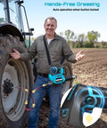 Man using 10000 PSI Electric Grease Gun With 3 Speed Control Cordless Battery Pack 2 Batteries Brushless Motor 39 Inch Hose