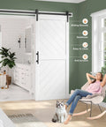 36 Inch By 84 Inch Sliding Barn Door With Six Point Six Foot Hardware Kit And Handle Included Solid MDF Wood Slab Covered With Water Proof And Scratch Resistant PVC Surface Simple Do It Yourself Assembly Chevron Pattern shown installed in a modern living room