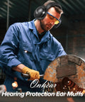 Man wearing noise canceling ear muffs for adults and kids, hearing protection in workshop using grinder with sparks