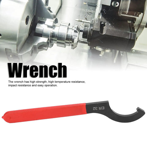 Heavy Duty ER32 Collet Wrench Made From High Speed Steel For Lathe Machines with red grip, 23cm long, in workshop setting.