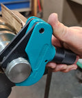 Universal Thread Repair Tool And Restorer For All Threads In Range Five Eighths Inch To One And A Half Inches External Or Internal Threads Metric And SAE One Hand Tool Quick Sizing Chases And Repairs Threads being used on a metallic object.