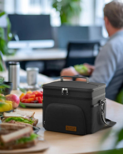 Premium 9 Liter Soft Sided Cooler Bag With Leak Proof Design Keeps Your Grub Fresh All Day on office table with sandwiches.
