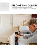 Man using Plastic Corner Bracket Shelf Supports Right Angle Brackets For Easy Furniture And Cabinet Repair Durable Quick Install 100 Pcs Fits Cabinets Chairs Wardrobes And Shelves under a sink