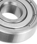 Close-up of a single high speed ball bearing, part of a set of ten for skateboards, inline skates, scooters and roller blades.
