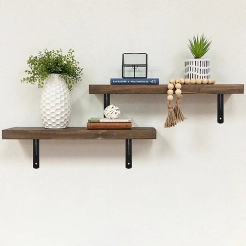 Floating shelves supported by 12 Pack 16 By 10 Inch Built Like A Tank Metal L Shaped Shelf Brackets Wall Mounted with decor items