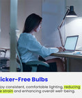 Woman working in an office lit by A19 LED Light Bulbs 60W Equivalent Non Dimmable, 800 Lumens, E26 Base, Daylight 5000K, 80 CRI