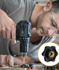Top Shelf 10 Pack M8 Knurled Clamping Nuts With Slick Black Star Thumb Grips For Dead Simple Machinery Maintenance and Knockout Reliable Latch Adjustments, close-up of black star grip being used with a drill.