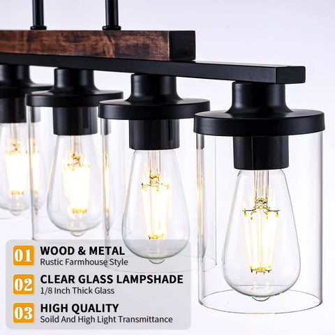 Close-up of Modern Farmhouse 5 Light Linear Chandelier for Kitchen Island and Dining Room with clear glass shades glowing.