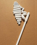 22 Piece PTFE Magnetic Stir Bar Set With Retriever showing 21 assorted Teflon-coated stir bars and retriever rod for lab use.