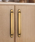Antique Brass Zinc Alloy Cabinet Handle With Backplate 7.56 Inch Center To Center 192mm 2 Pack installed on wooden cabinet