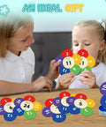 Two kids playing with Smart Math Card Game For Kids Ages 6 Plus That Turns Multiplication Division Addition And Subtraction Practice Into Real Fun