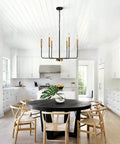 Modern Farmhouse Black And Gold 6 Light Candle Chandelier With Adjustable Height Chain And Rods Ceiling Light Fixture Above Dining Table
