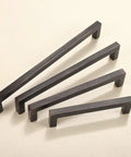 10 Pack Oil Rubbed Bronze Solid Zinc Cabinet Pulls, 5 Inch Center to Center, 5.35 Inch Overall Length, showing square handles on display