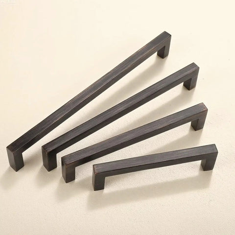 10 Pack Oil Rubbed Bronze Solid Zinc Cabinet Pulls, 5 Inch Center to Center, 5.35 Inch Overall Length, showing square handles on display